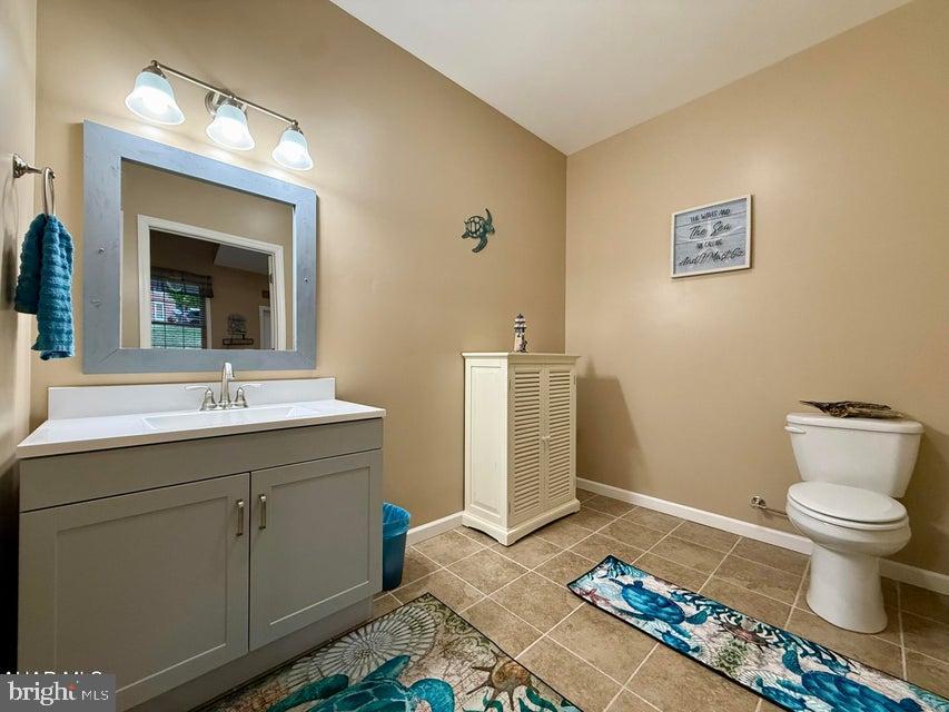 911 Lower Main Street Saxton, PA 16678 - Photo 19 of 63 a bathroom with a sink and a toilet