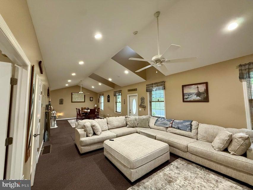 911 Lower Main Street Saxton, PA 16678 - Photo 2 of 63 a living room with furniture and a chandelier