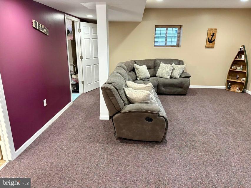 911 Lower Main Street Saxton, PA 16678 - Photo 33 of 63 a living room with furniture and a flat screen tv