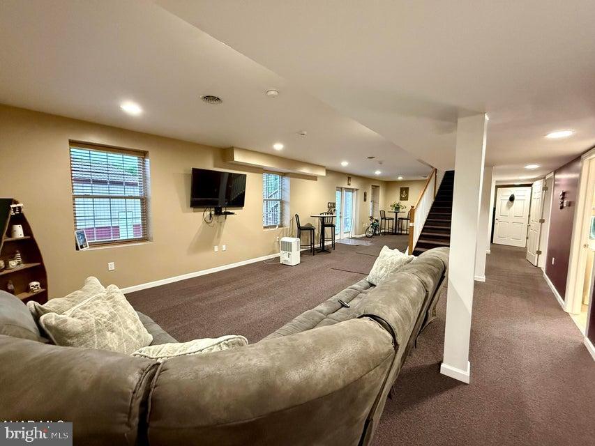 911 Lower Main Street Saxton, PA 16678 - Photo 34 of 63 a living room with furniture and a flat screen tv