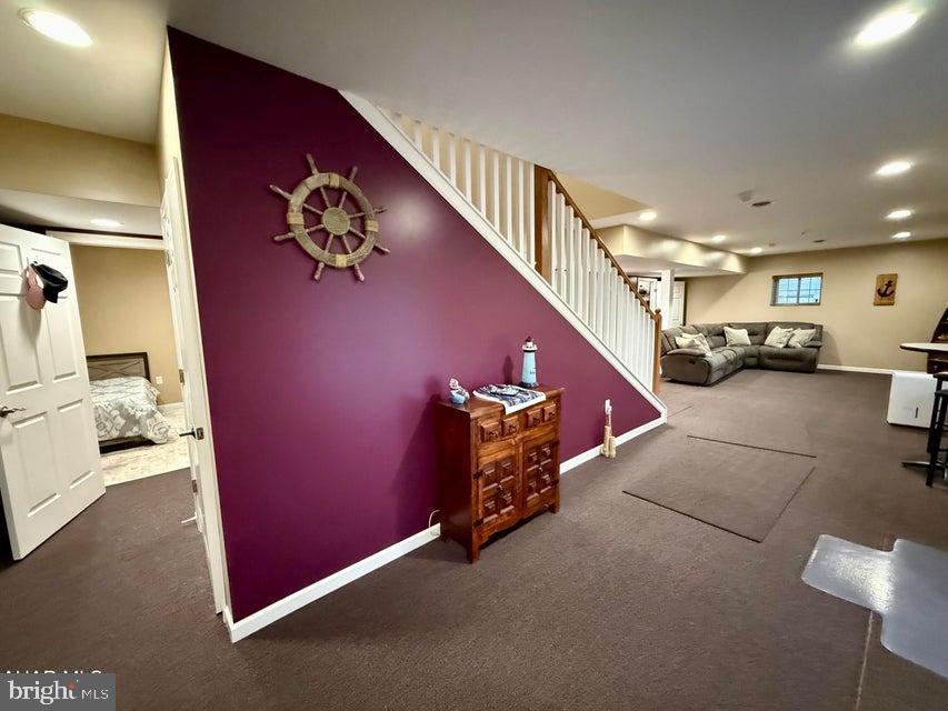 911 Lower Main Street Saxton, PA 16678 - Photo 37 of 63 a view of hallway with couch and a chandelier