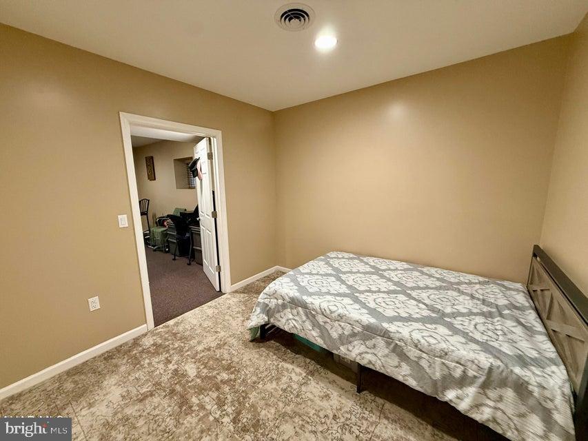 911 Lower Main Street Saxton, PA 16678 - Photo 42 of 63 a bedroom with a bed and a window