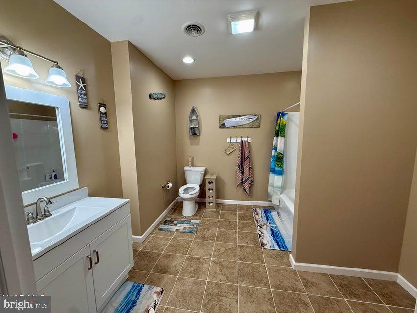 911 Lower Main Street Saxton, PA 16678 - Photo 43 of 63 a bathroom with a sink and a mirror