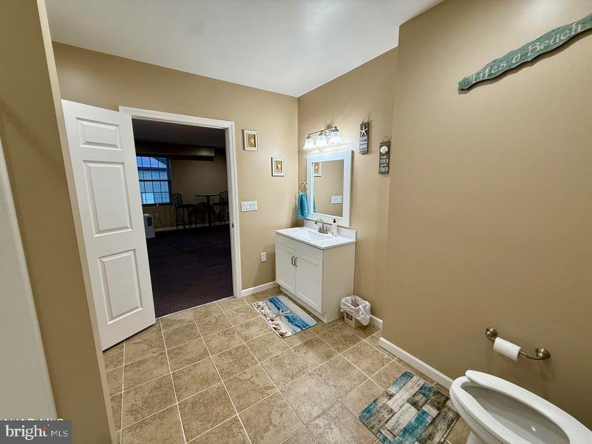 911 Lower Main Street Saxton, PA 16678 - Photo 44 of 63 a bathroom with a sink toilet and shower