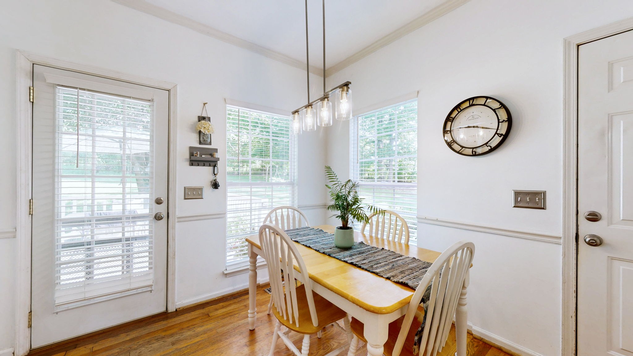200 Eastside Road Burns, TN 37029 - Photo 11 of 32 a view of a dining room with furniture window and wooden floor