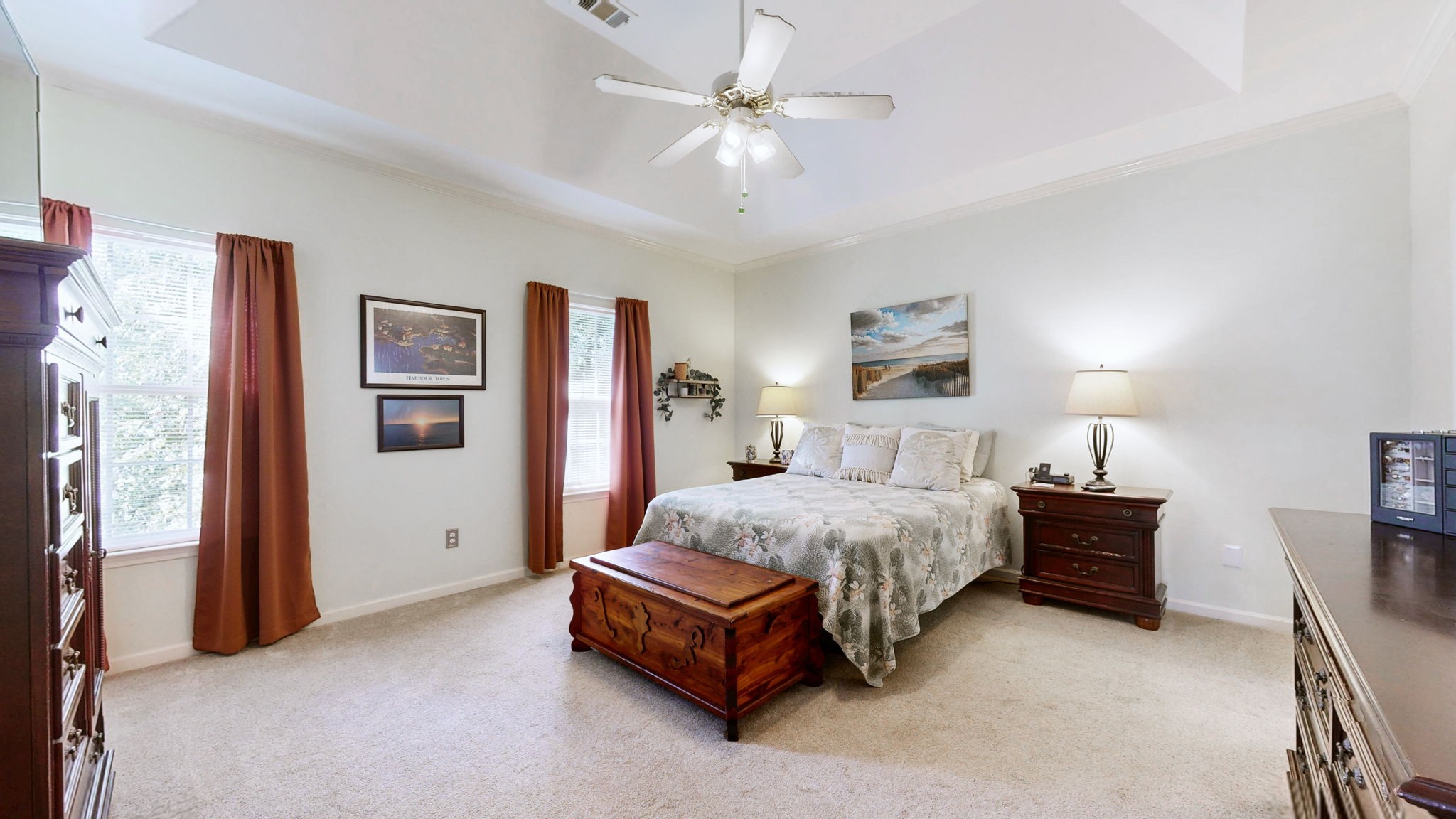 200 Eastside Road Burns, TN 37029 - Photo 14 of 32 a spacious bedroom with a bed and a chandelier