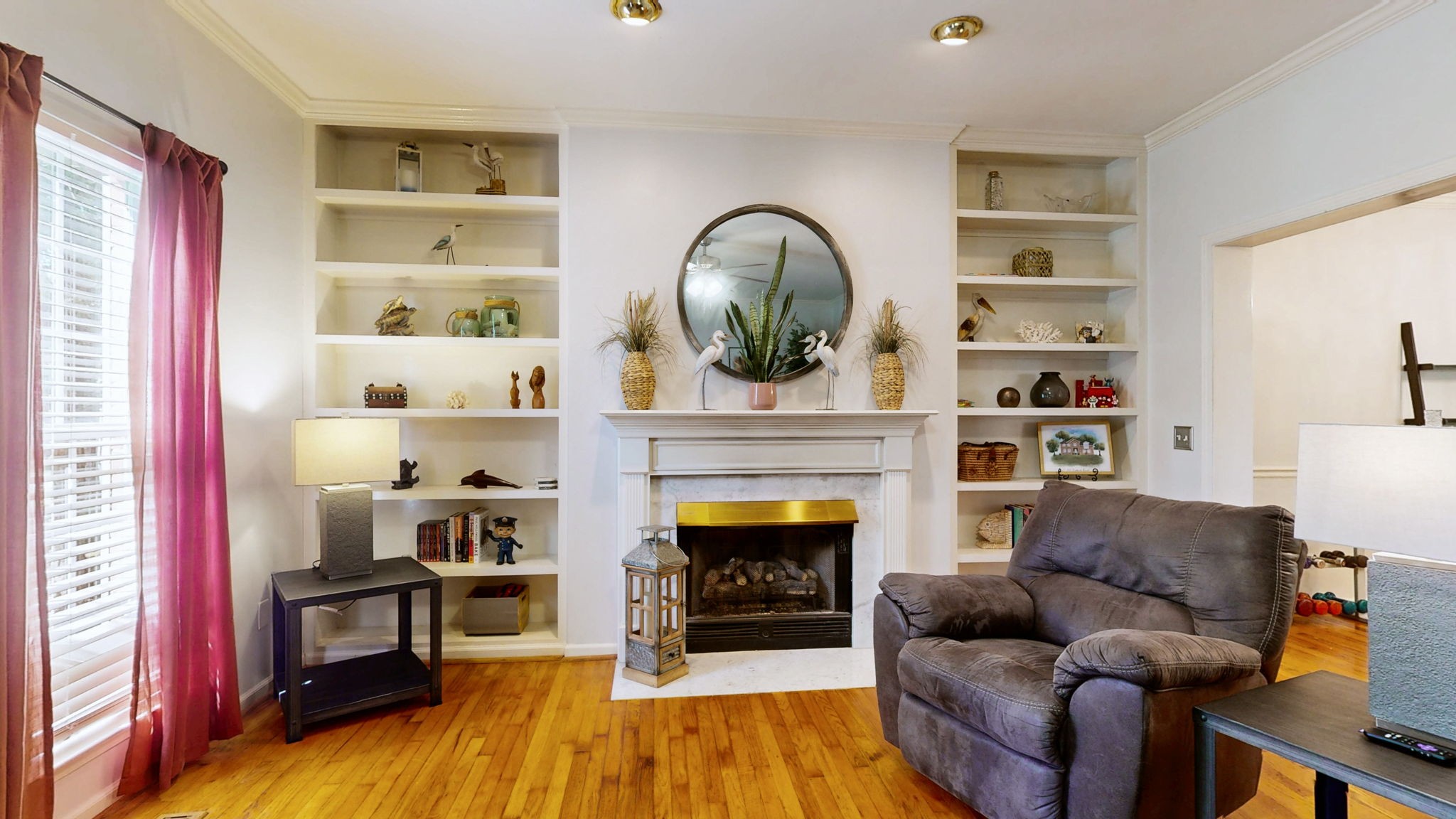 200 Eastside Road Burns, TN 37029 - Photo 6 of 32 a living room with furniture and a fireplace