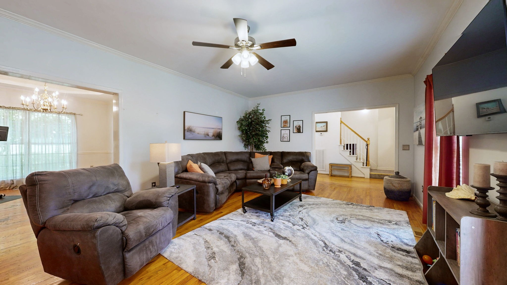 200 Eastside Road Burns, TN 37029 - Photo 7 of 32 a living room with furniture ceiling fan and a wooden floor