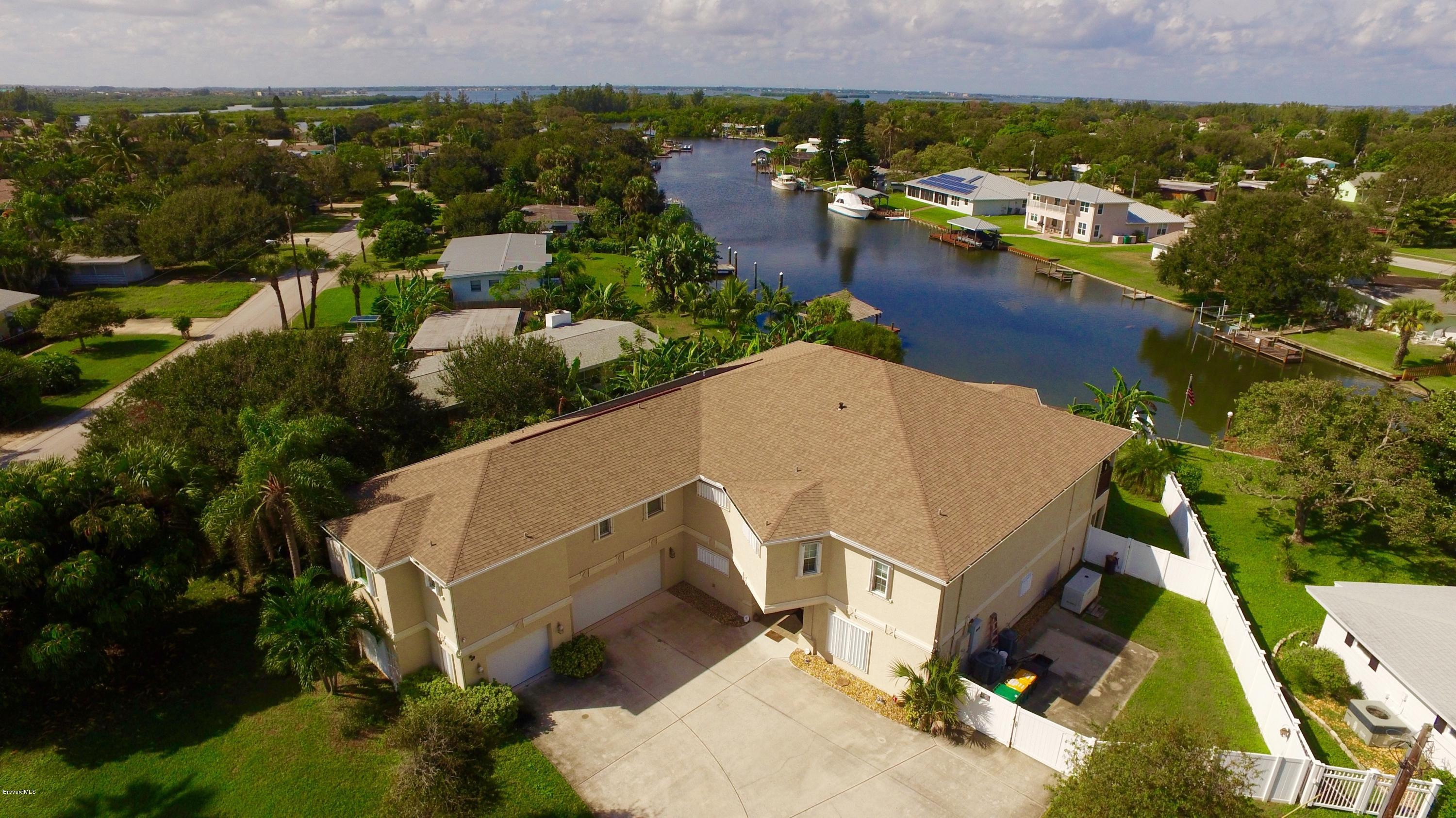 813 Catalina Road Cocoa Beach, FL 32931 - Photo 1 of 24 1-Aerial Welcome Home