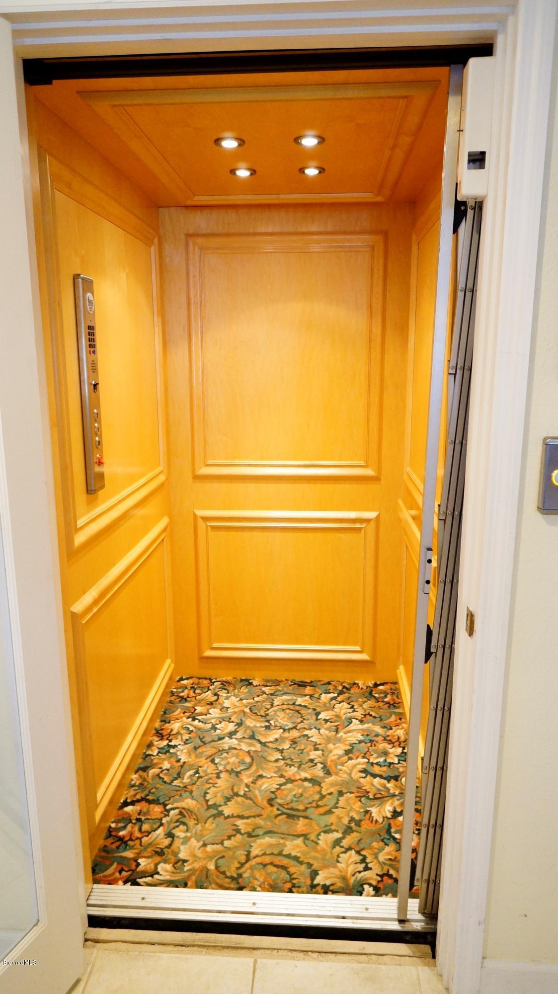 813 Catalina Road Cocoa Beach, FL 32931 - Photo 13 of 24 13-Elevator