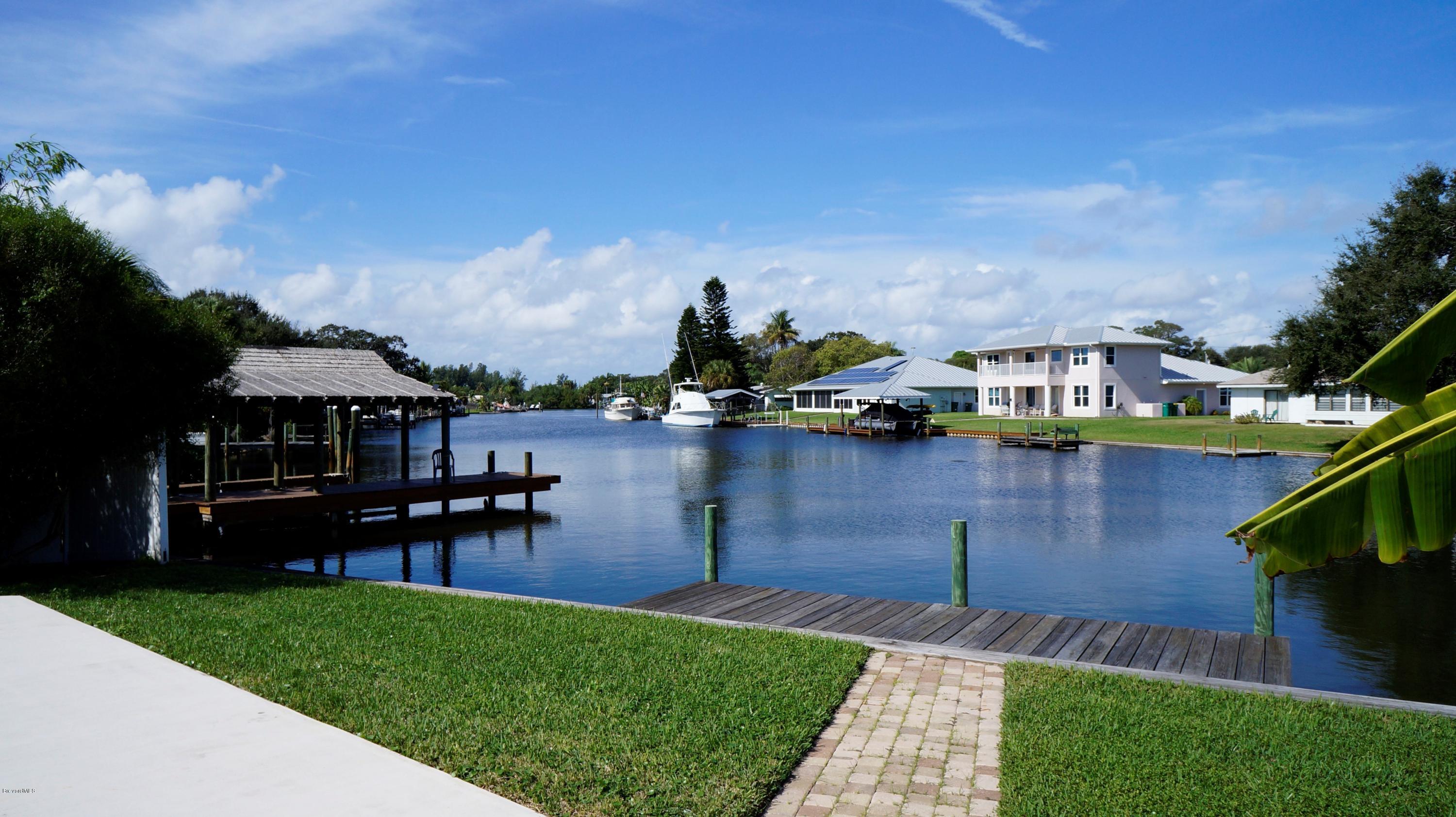 813 Catalina Road Cocoa Beach, FL 32931 - Photo 21 of 24 21-Private Dock and Seawall See Manatees