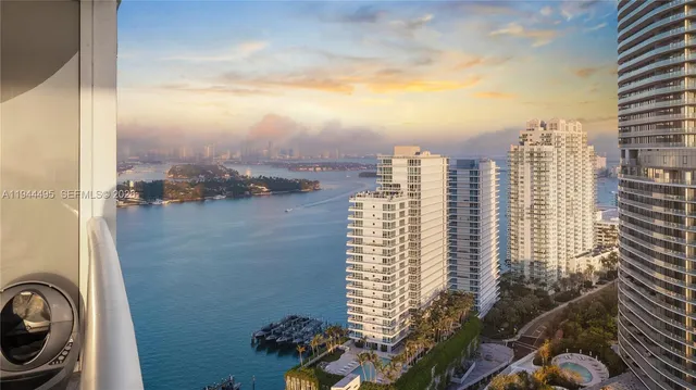 a view of city with ocean