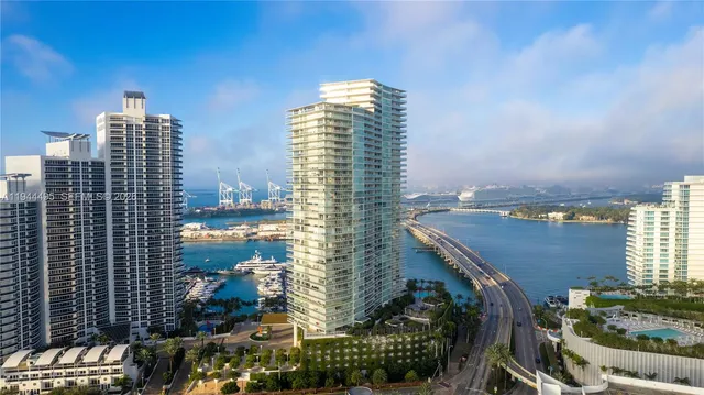 a view of a city with tall buildings