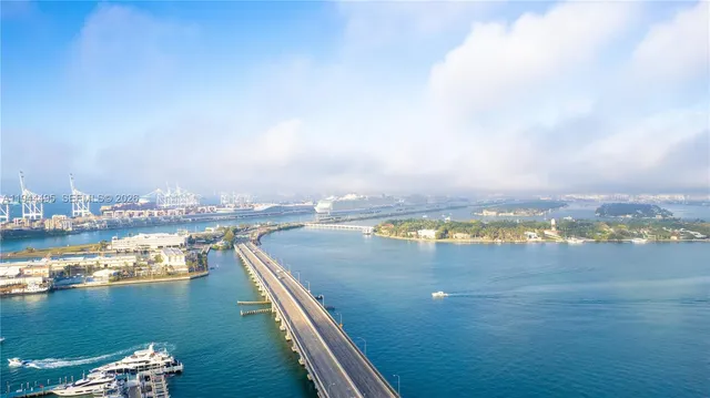a view of a lake with city