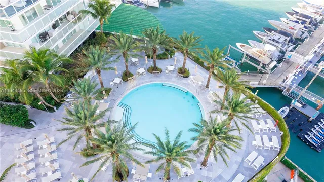 a picture of a lake with a building in front of it