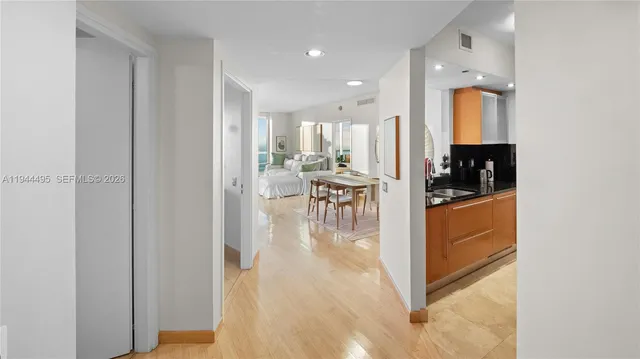 a view of a kitchen and dining room