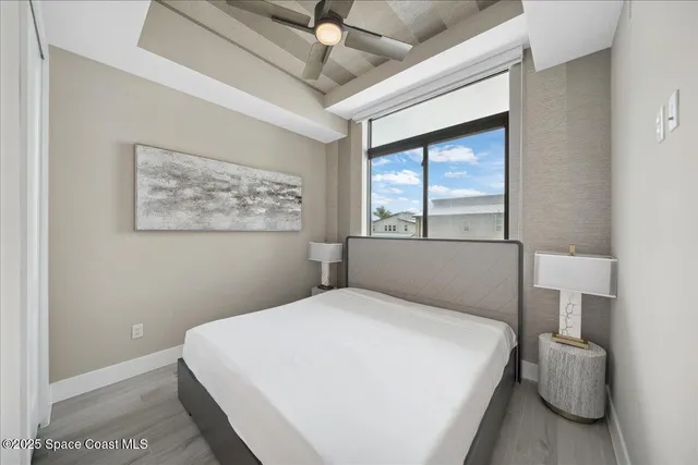 a bedroom with a bed and a view of bathroom