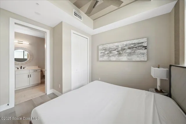 a bathroom with a double vanity sink mirror toilet and bathtub