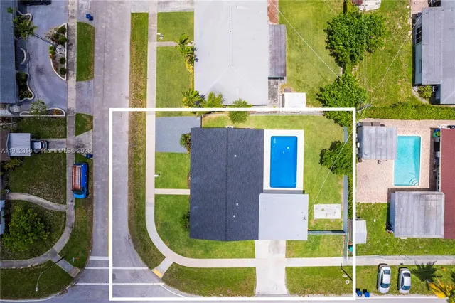 front view of house with a swimming pool
