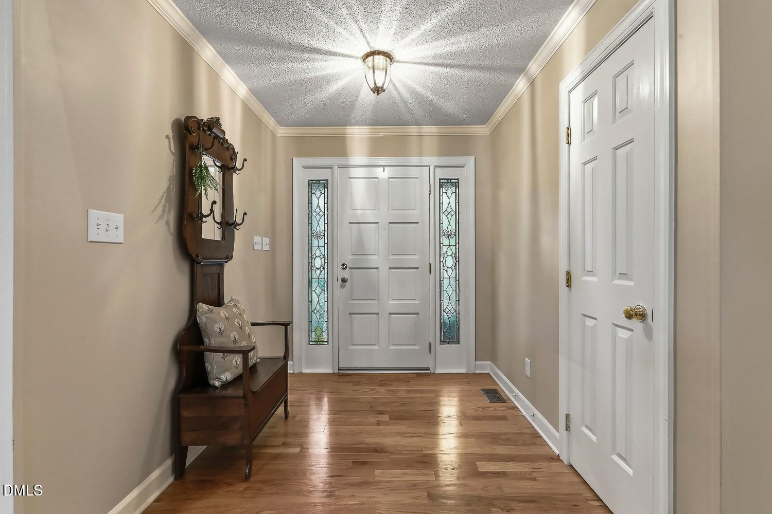 8208 Aberloch Court Raleigh, NC 27606 - Photo 6 of 80 011-040-Foyer-1500x1000