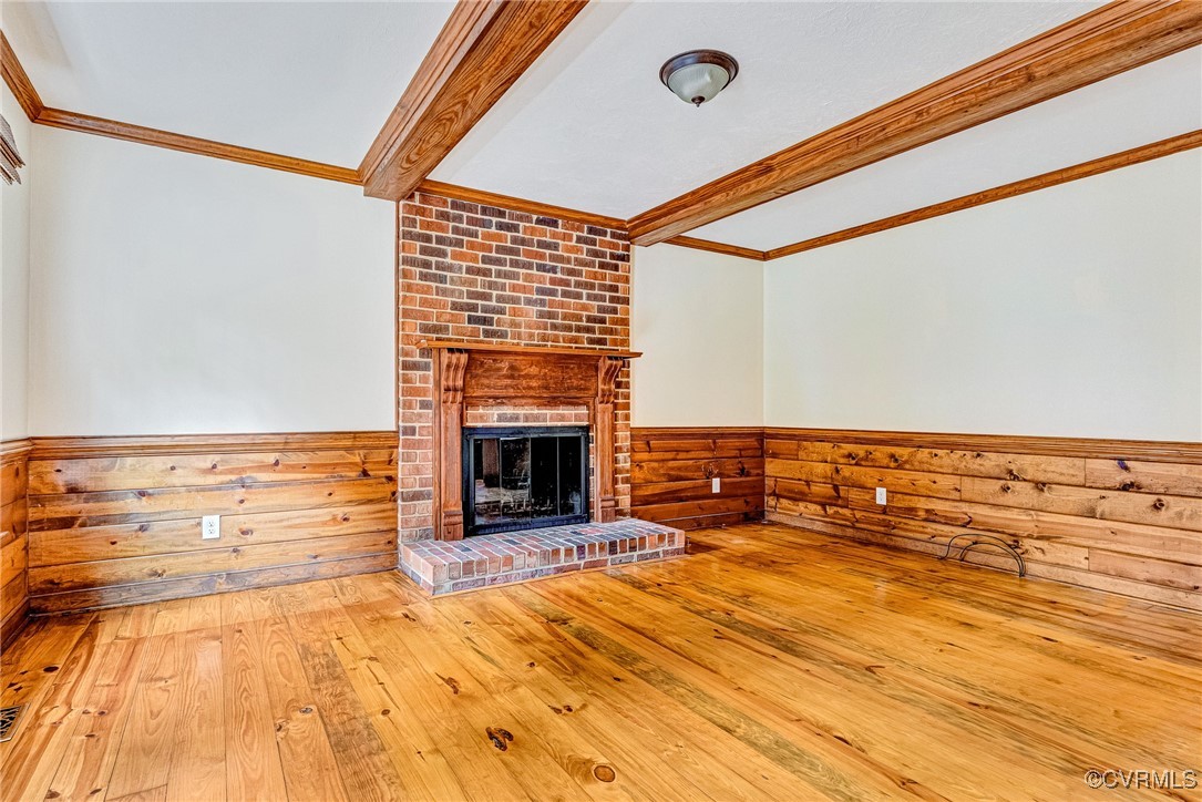 7400 Turner Road Henrico, VA 23231 - Photo 11 of 47 a view of an empty room with wooden floor and a fireplace