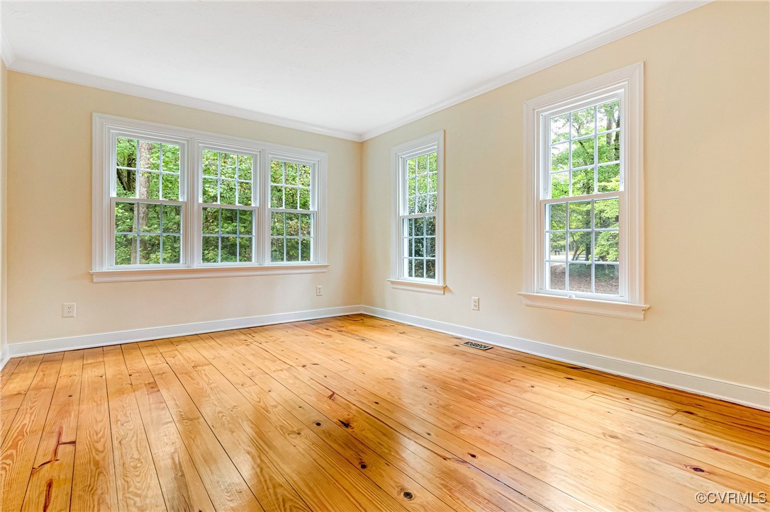 7400 Turner Road Henrico, VA 23231 - Photo 15 of 47 a view of an empty room with wooden floor and a window