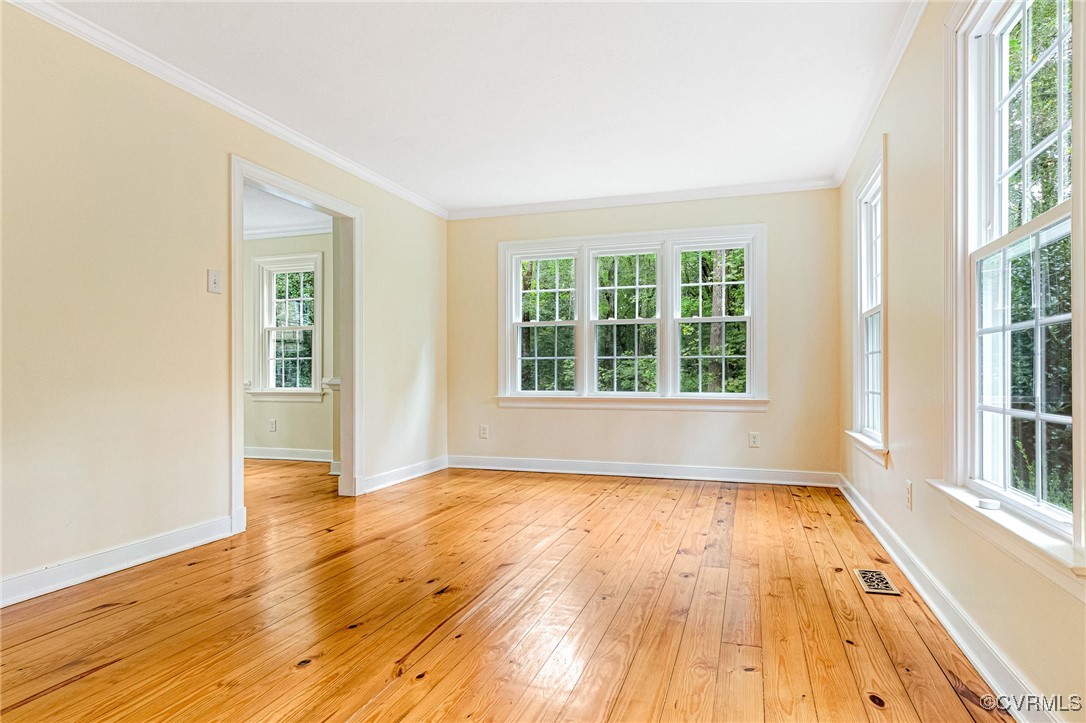 7400 Turner Road Henrico, VA 23231 - Photo 16 of 47 a view of an empty room with wooden floor and a window