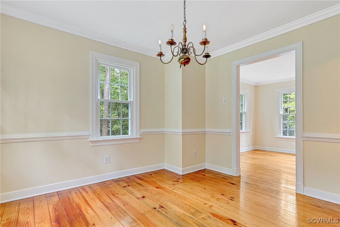 7400 Turner Road Henrico, VA 23231 - Photo 18 of 47 a view of an empty room with wooden floor and a window