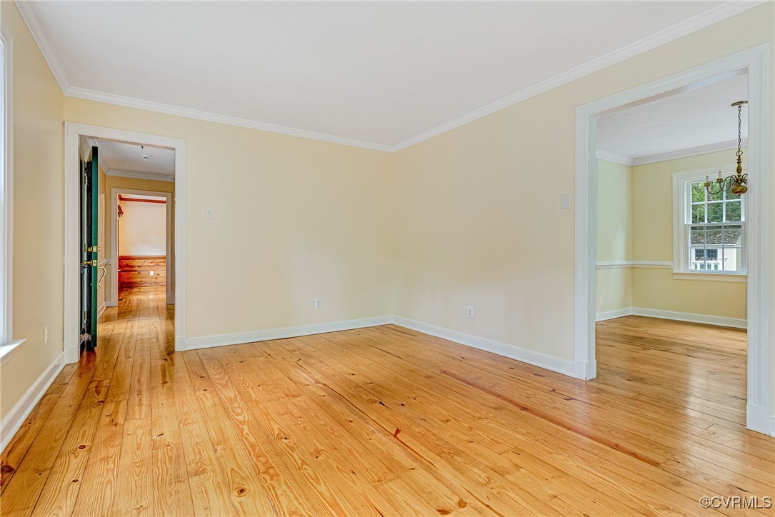 7400 Turner Road Henrico, VA 23231 - Photo 20 of 47 a view of empty room with wooden floor and fireplace