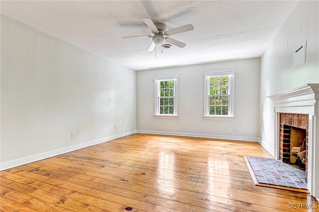 7400 Turner Road Henrico, VA 23231 - Photo 24 of 47 a view of an empty room with window and wooden floor