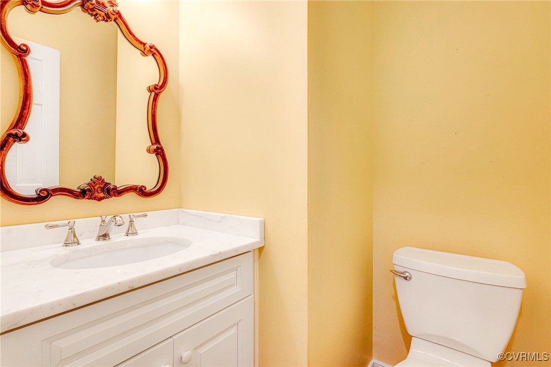 7400 Turner Road Henrico, VA 23231 - Photo 25 of 47 a bathroom with a sink and a mirror
