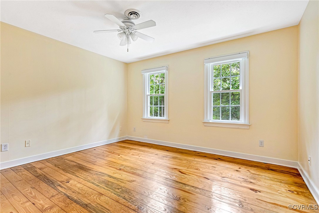 7400 Turner Road Henrico, VA 23231 - Photo 27 of 47 a view of empty room with wooden floor and fan