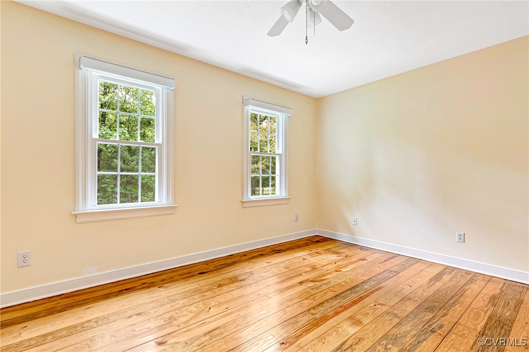 7400 Turner Road Henrico, VA 23231 - Photo 28 of 47 a view of an empty room with wooden floor and a window