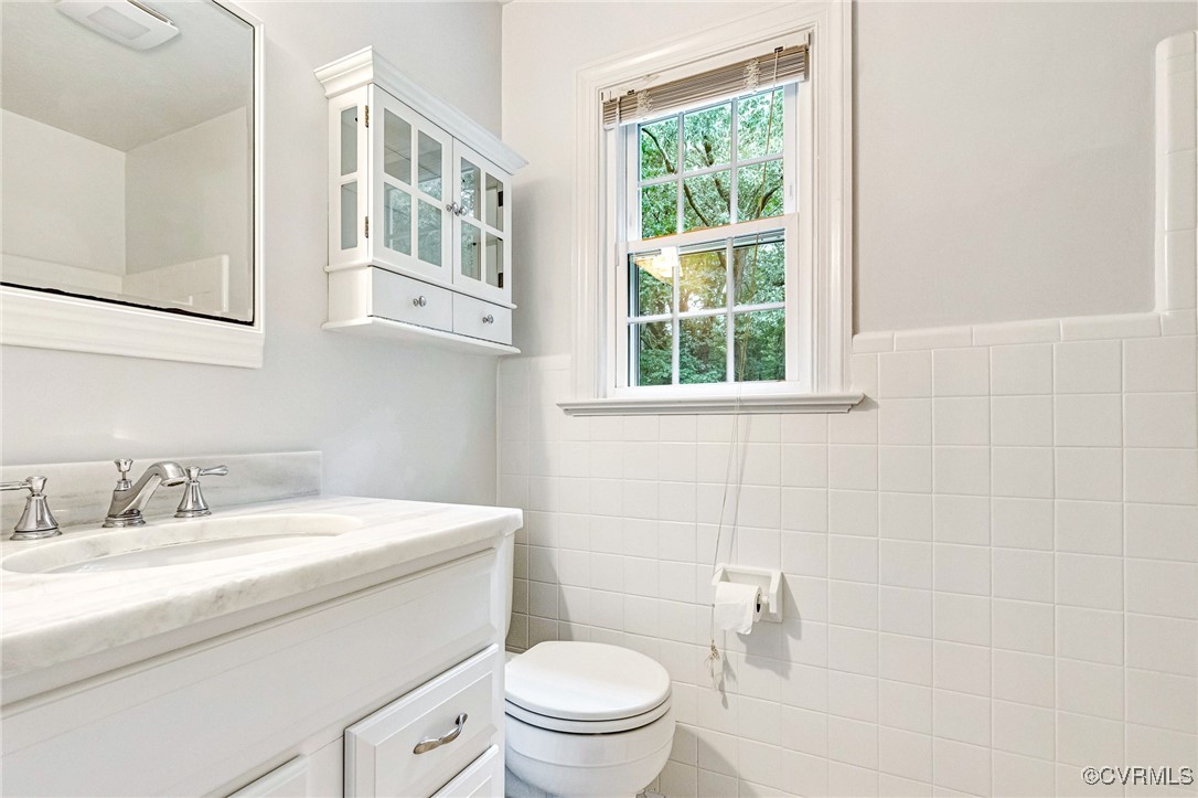 7400 Turner Road Henrico, VA 23231 - Photo 29 of 47 a bathroom with a sink a toilet and a window