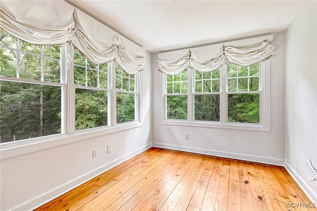 7400 Turner Road Henrico, VA 23231 - Photo 31 of 47 a view of a room with a large window and wooden floor