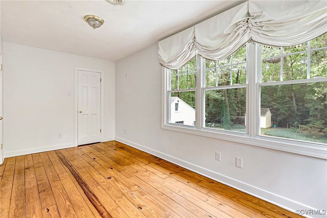 7400 Turner Road Henrico, VA 23231 - Photo 32 of 47 a view of a room with a large window and wooden floor