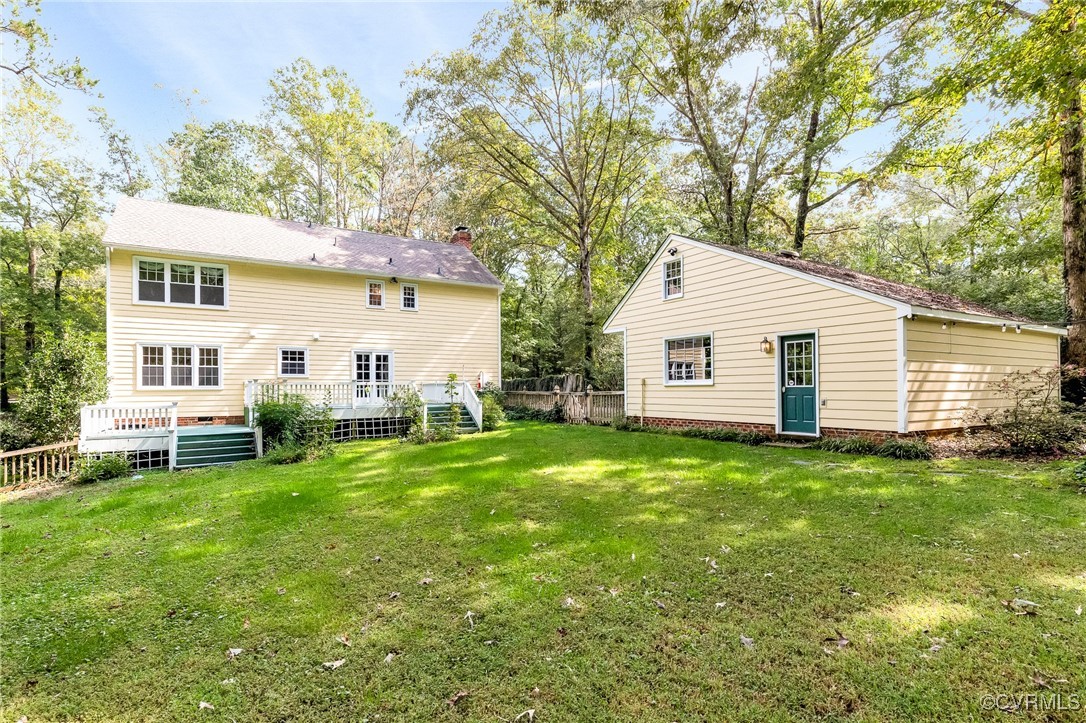 7400 Turner Road Henrico, VA 23231 - Photo 38 of 47 a view of a backyard with table and chairs and a tree