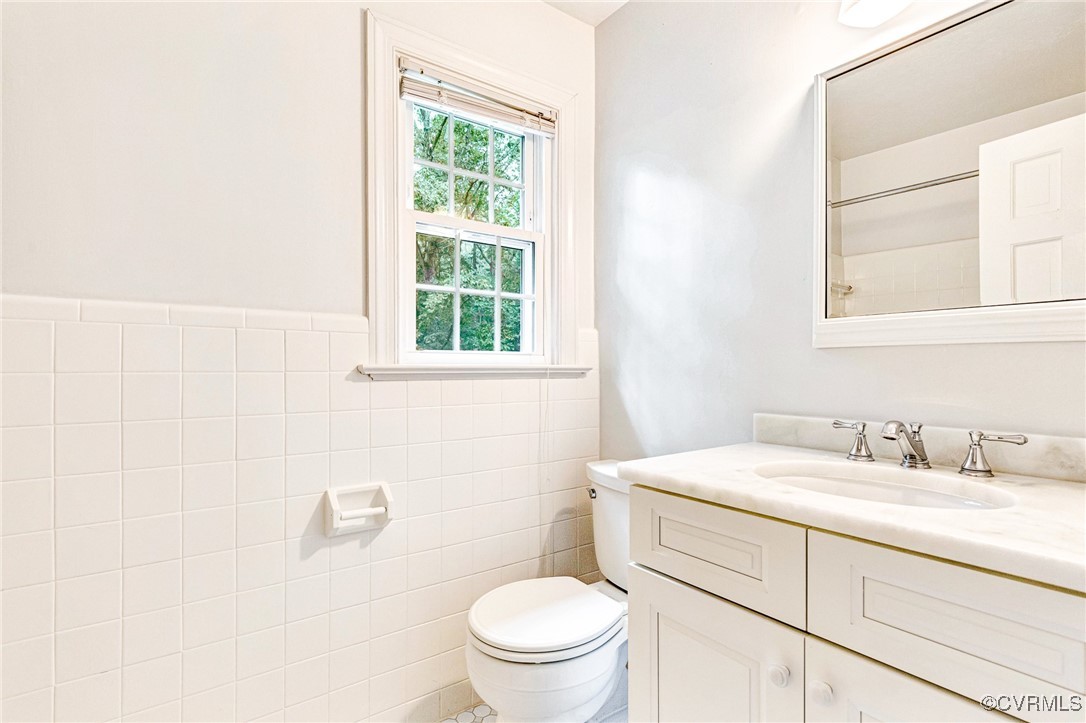 7400 Turner Road Henrico, VA 23231 - Photo 42 of 47 a bathroom with a sink a toilet and a window