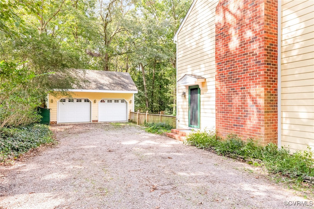 7400 Turner Road Henrico, VA 23231 - Photo 43 of 47 a view of a house with a yard and garage