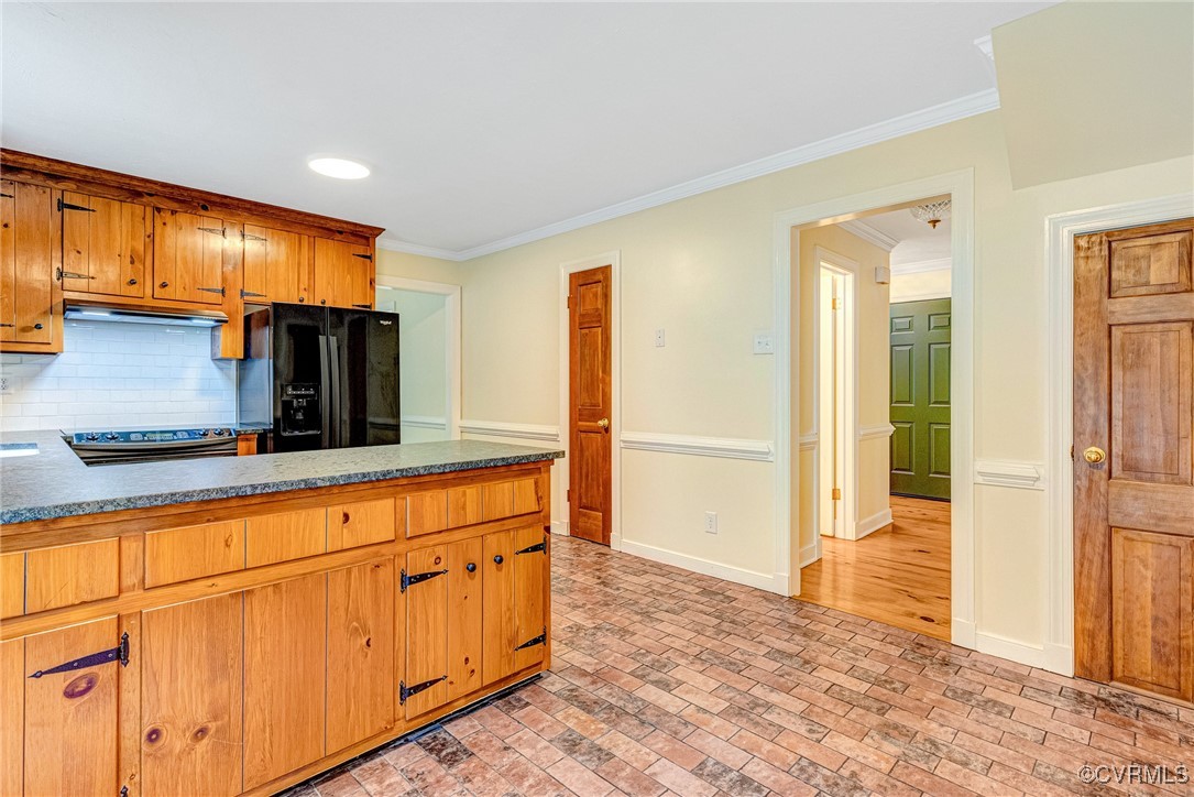 7400 Turner Road Henrico, VA 23231 - Photo 9 of 47 a kitchen with stainless steel appliances granite countertop a refrigerator and a sink