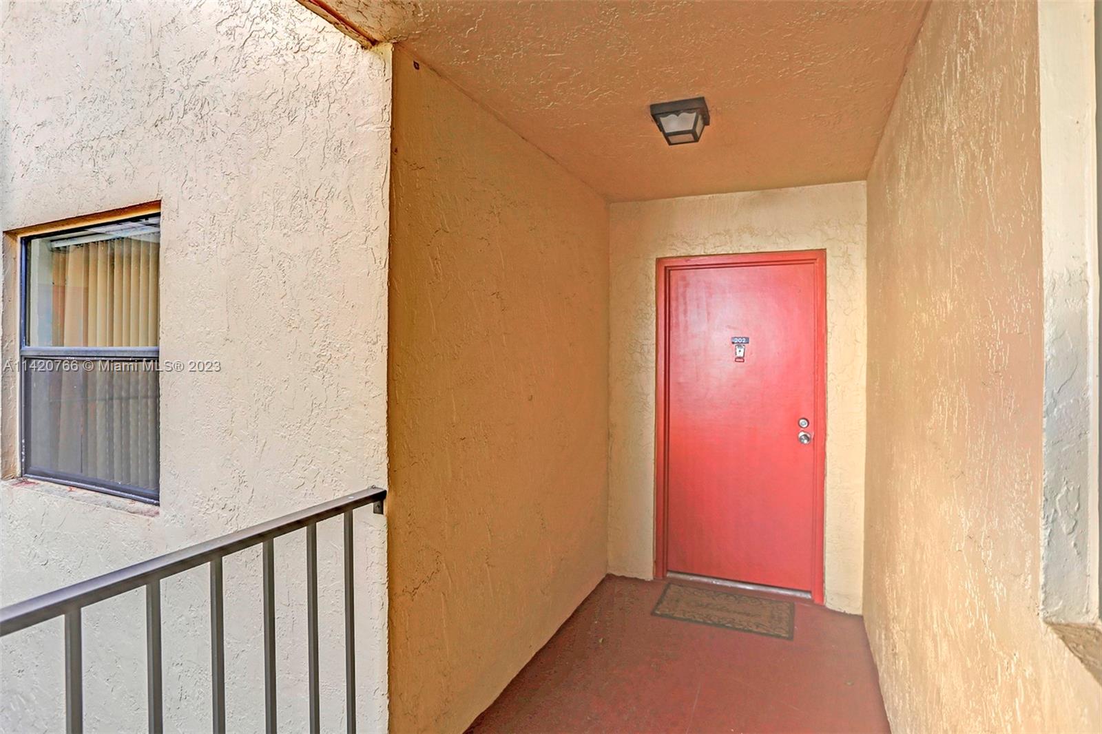 3410 Foxcroft Road, Unit 202 Miramar, FL 33025 - Photo 32 of 35 a view of a hallway