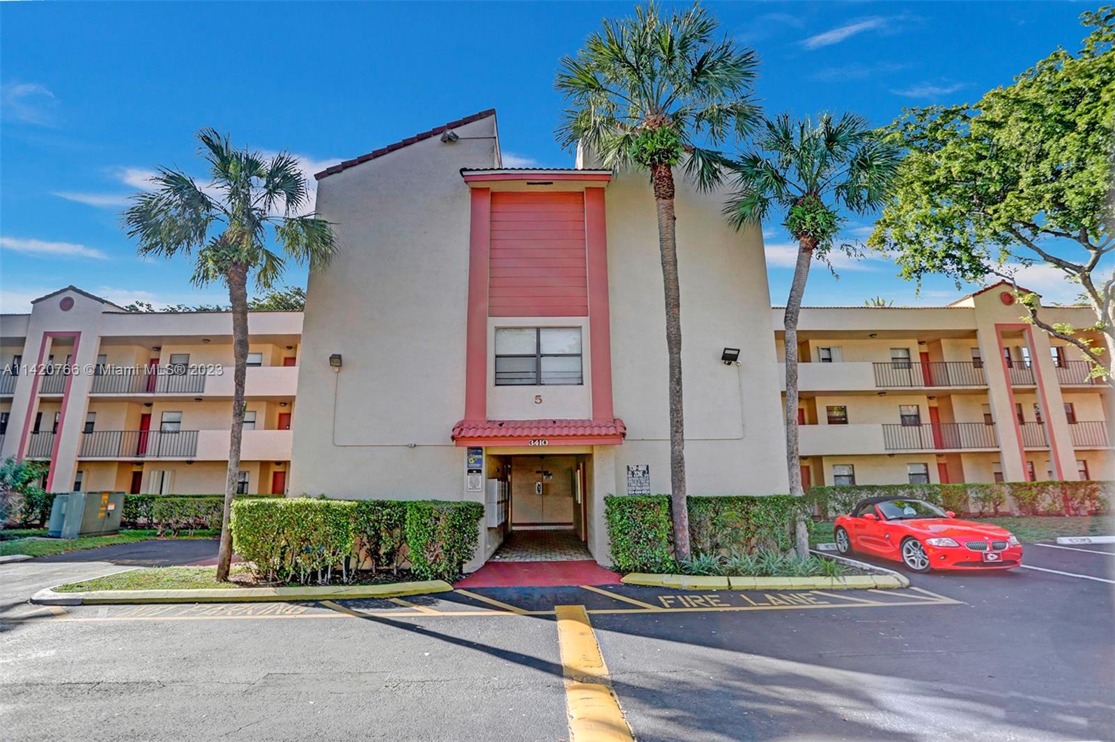 3410 Foxcroft Road, Unit 202 Miramar, FL 33025 - Photo 33 of 35 a front view of residential houses with yard