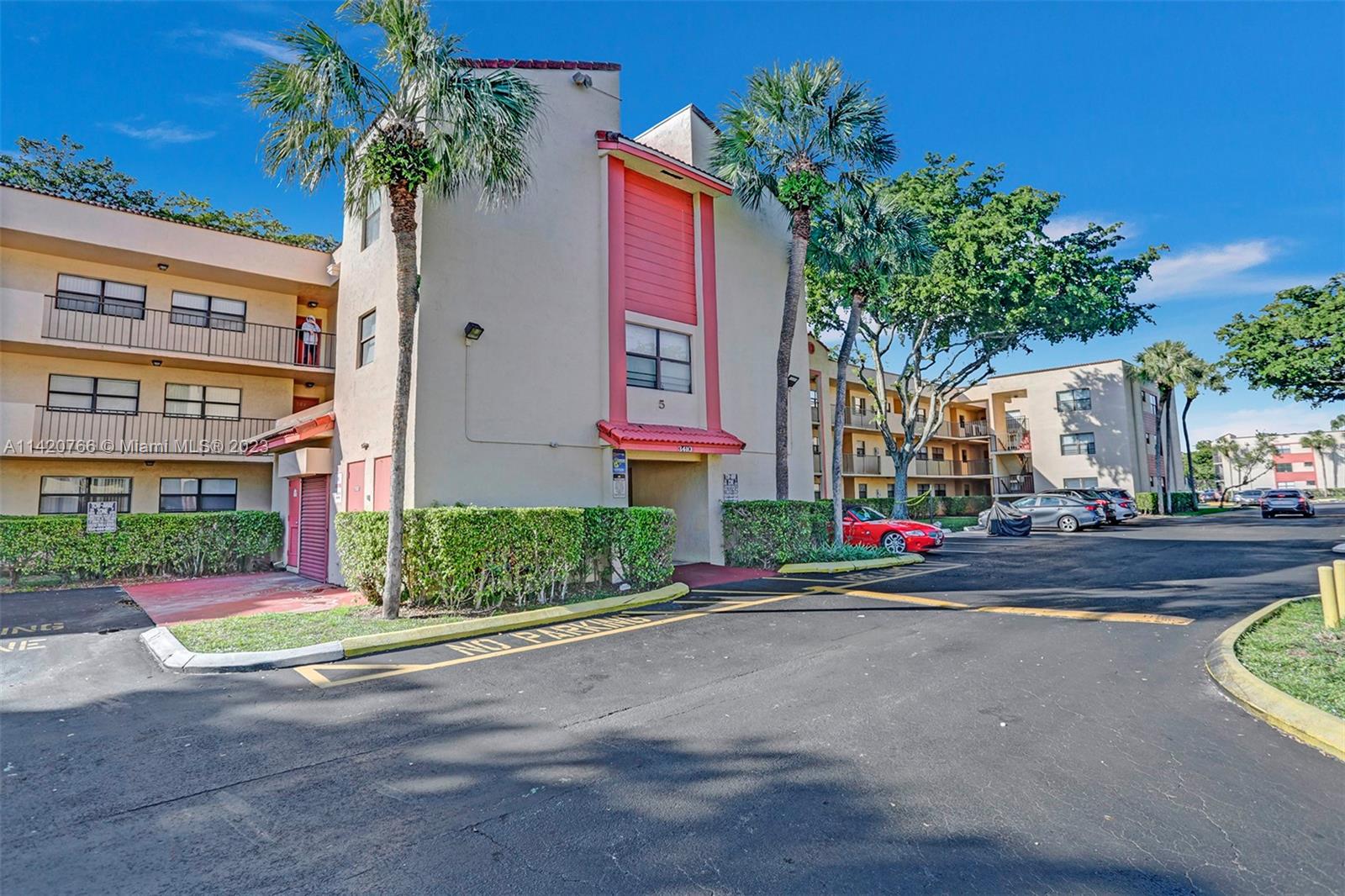 3410 Foxcroft Road, Unit 202 Miramar, FL 33025 - Photo 35 of 35 front view of a house with a street