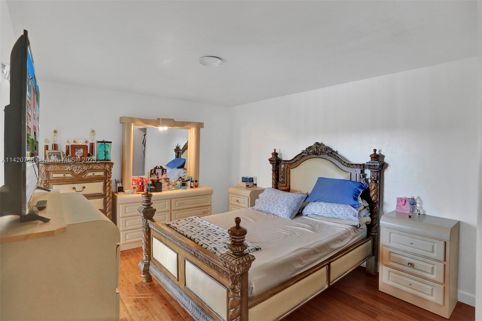 3410 Foxcroft Road, Unit 202 Miramar, FL 33025 - Photo 8 of 35 a bed room with a bed and a couch