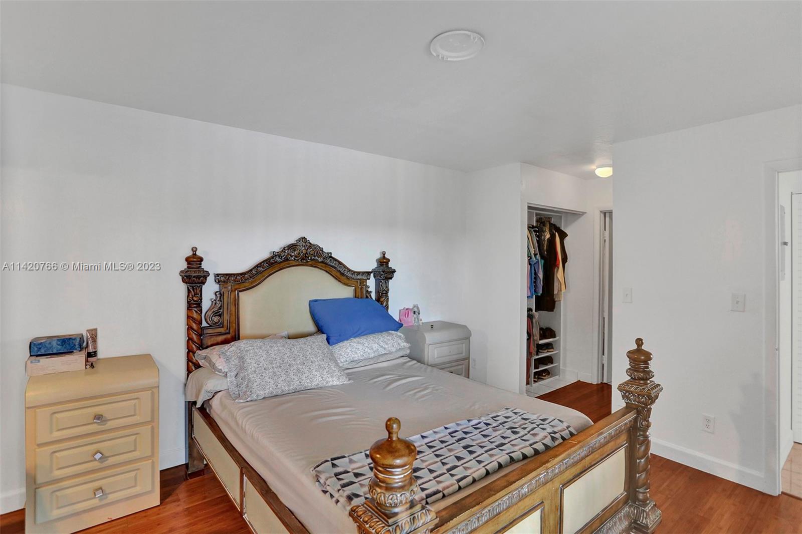 3410 Foxcroft Road, Unit 202 Miramar, FL 33025 - Photo 10 of 35 a bed room with a bed and a dresser