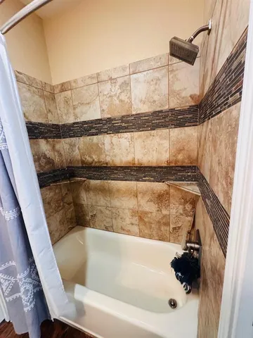 a bathroom with a bathtub