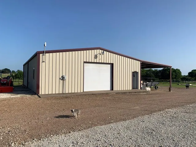 a front view of a house with a garage