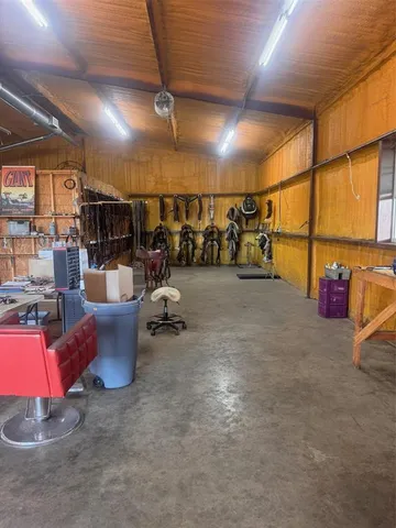 a view of a kitchen with a sink and a window