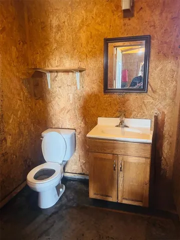 a view of a hallway with stairs