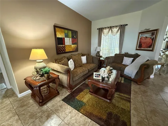 a bedroom with a bed and a mirror